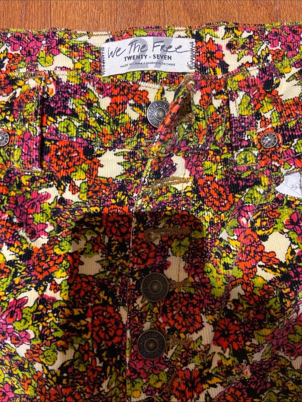 We The Free Floral Skinny Pants in Cream with Pink, Orange & Green Print